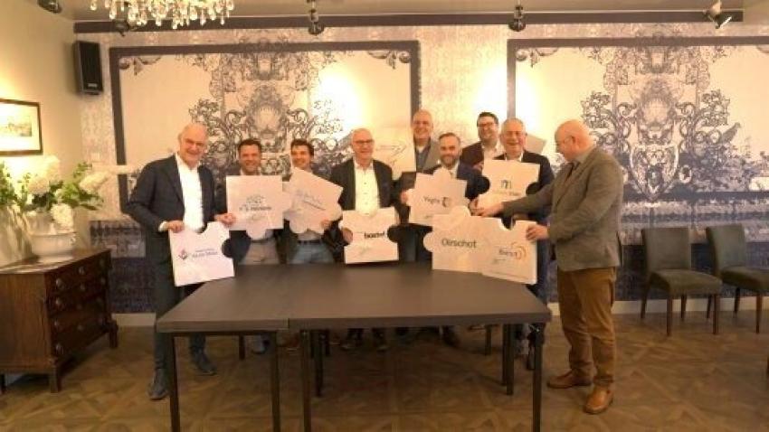 De partners die de samenwerkingsovereenkomst hebben ondertekend.